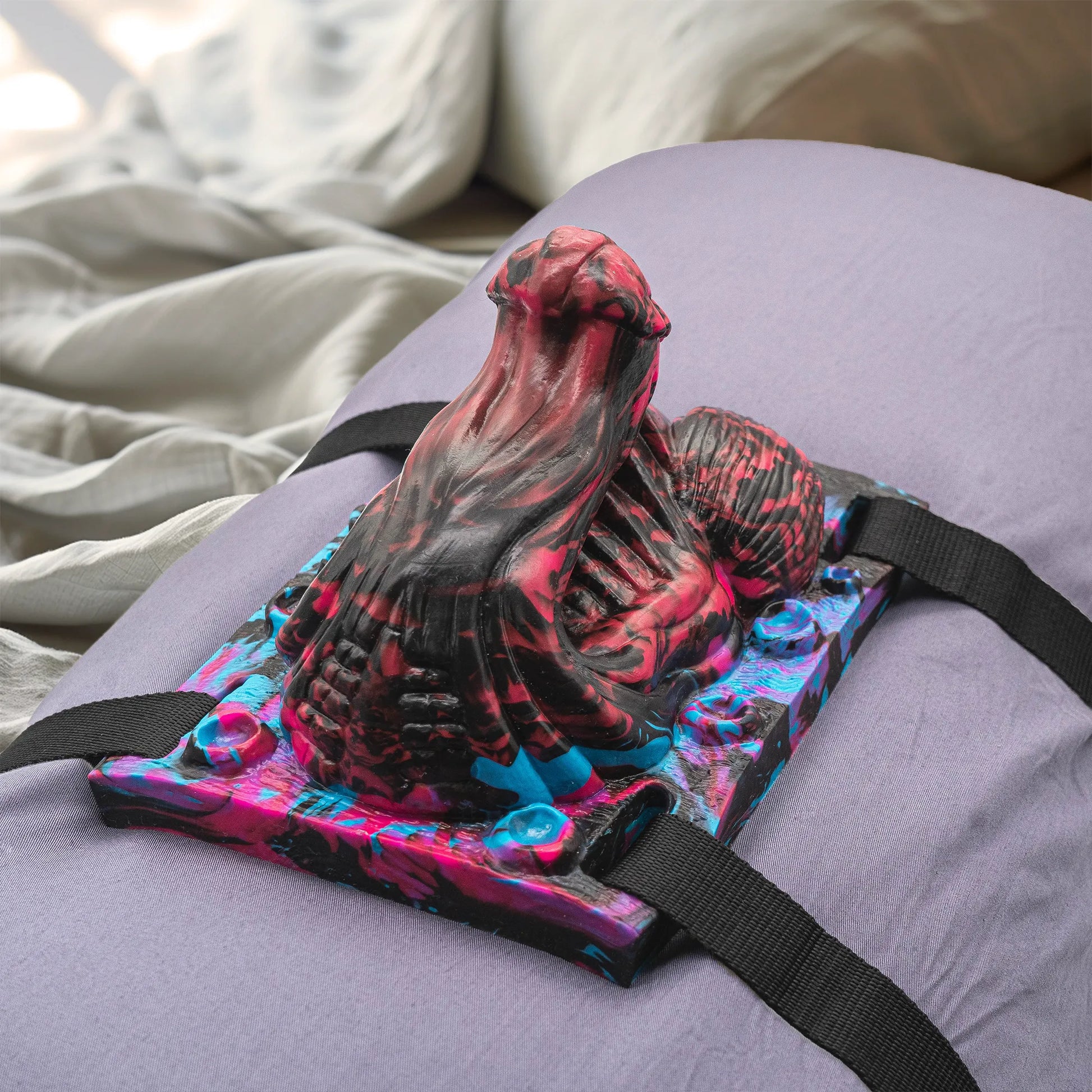 Dominus Insertable Sex Grinder on a pillow