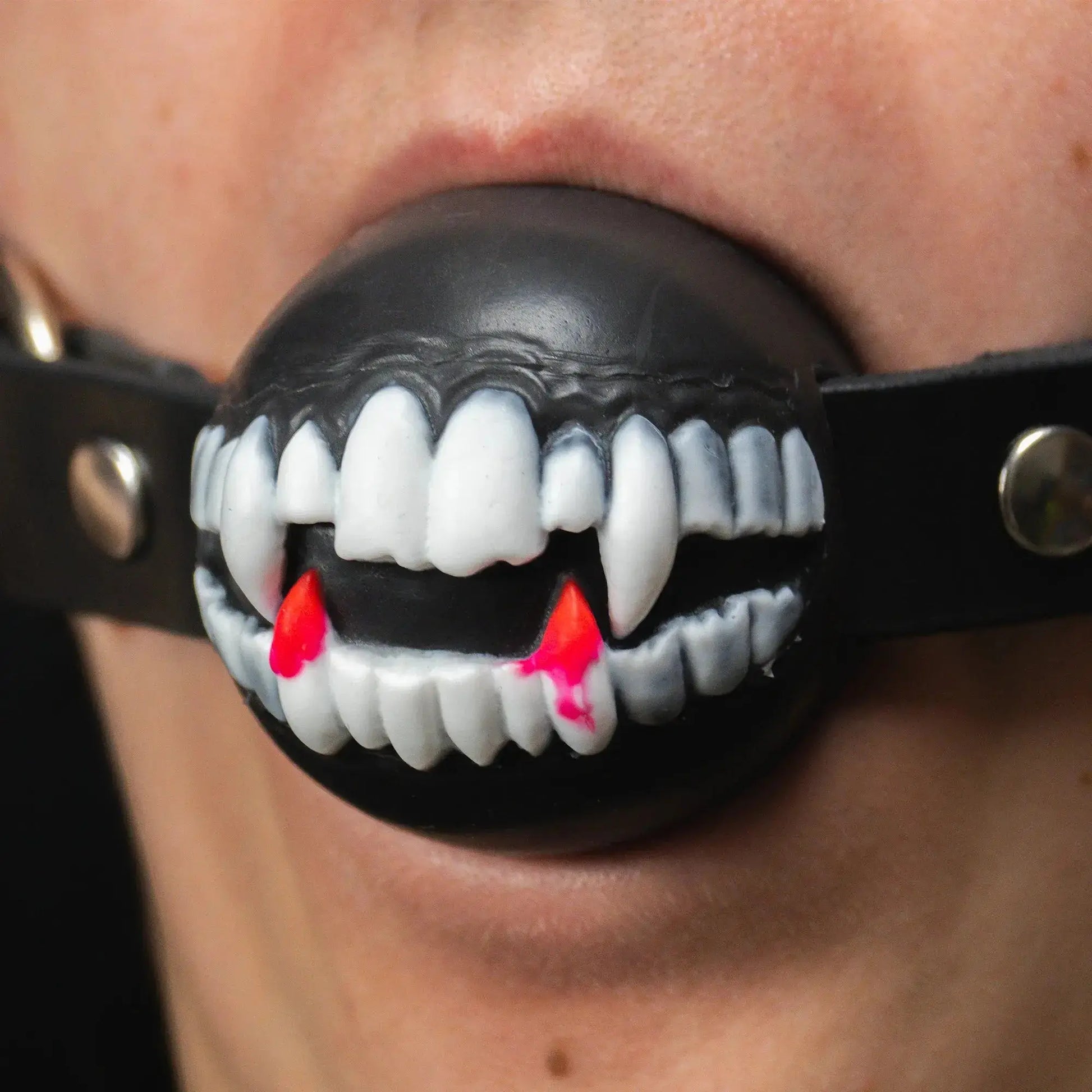 Gagula Ballgag with Vampire Fangs in mouth