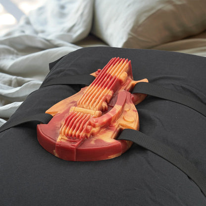 G-String the Guitar Grinder Sex Toy on Pillow