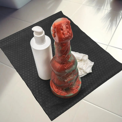 G-Sting Advanced Knotted Dildo lifestyle next to lube bottle