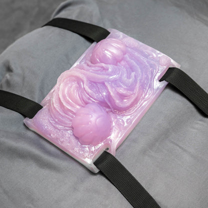 Stinger Jelly Sex Toy Grinder strapped to a pillow