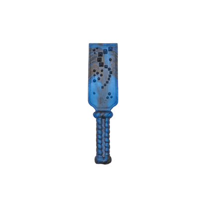 The Knaughty Spanker is a spanking paddle. This spanking paddle is flat on one side, and adorned with studs on the other -- it keeps even the most mischievous brats in line with one thuddy sting. 