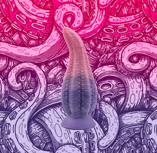DAKKEN is a tentacle dildo. A girthy, full-bodied fantasy dildo in the shape of an octopus' tentacle. The DAKKEN tentacle dildo has small suckers running down the insides of each tentacle -- adorning you with a ribbed sensation.